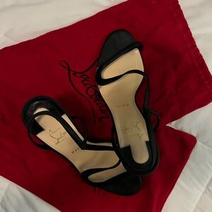 Christian Louboutin red bottom, heeled sandals. Used. Excellent condition.